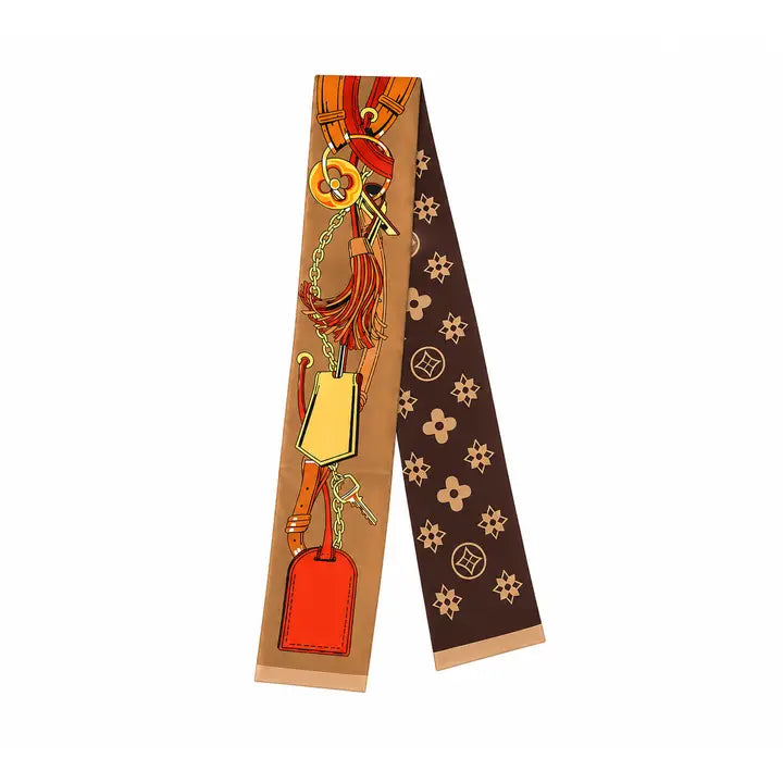 Decorative ribbon with key and tag design on a white background