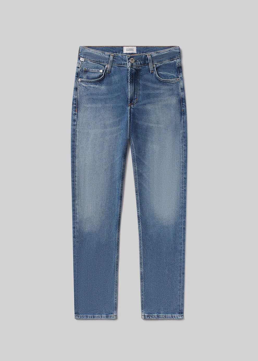 Blue jeans on a light gray background