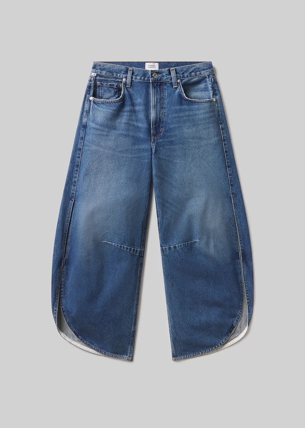 Blue jeans on a gray background