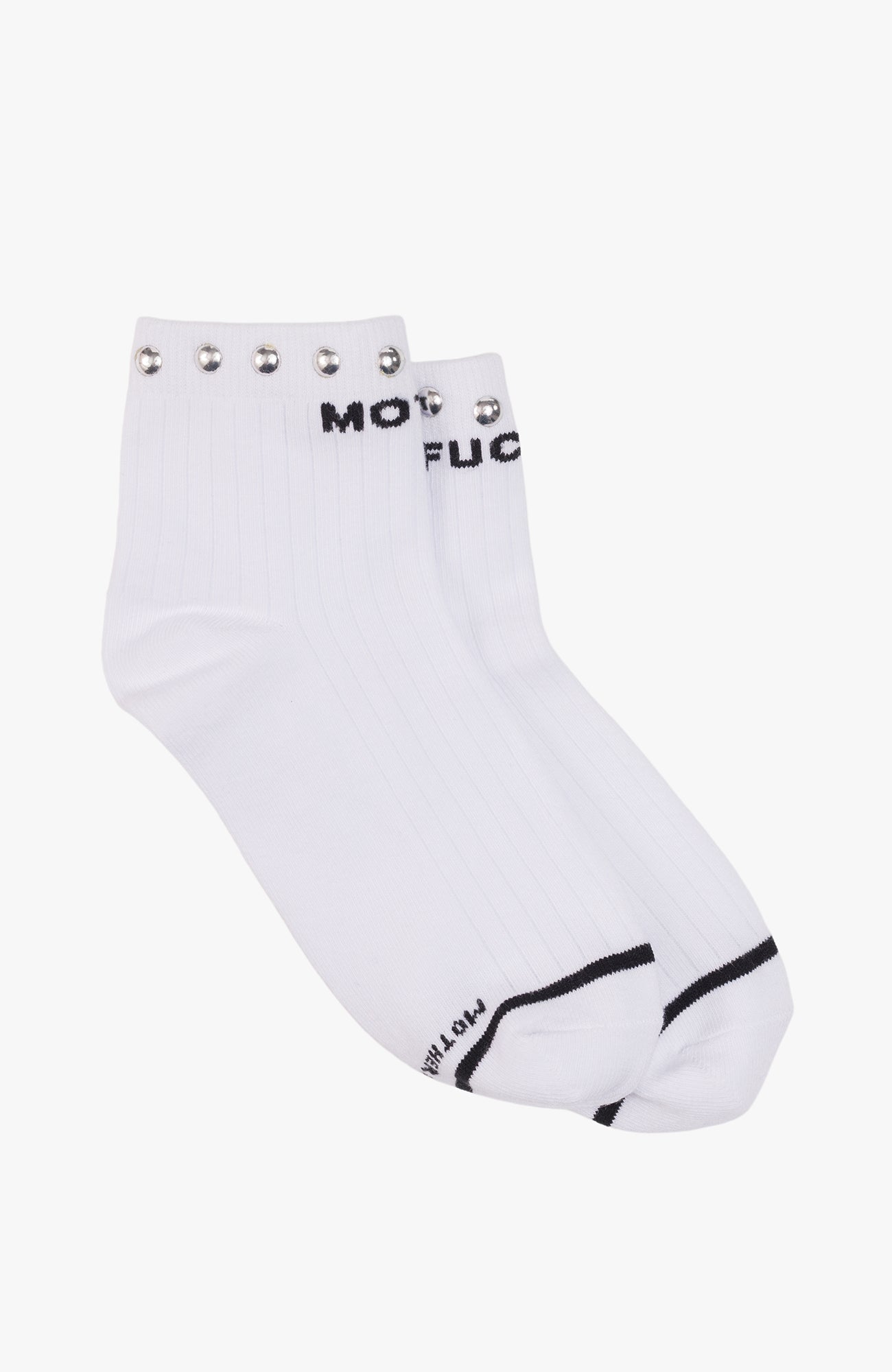 A pair of white ankle socks with black text reading 'MOT FUC' on the cuff, silver metal grommets along the top edge, and a black stripe detail near the toe, shown on a light gray background.