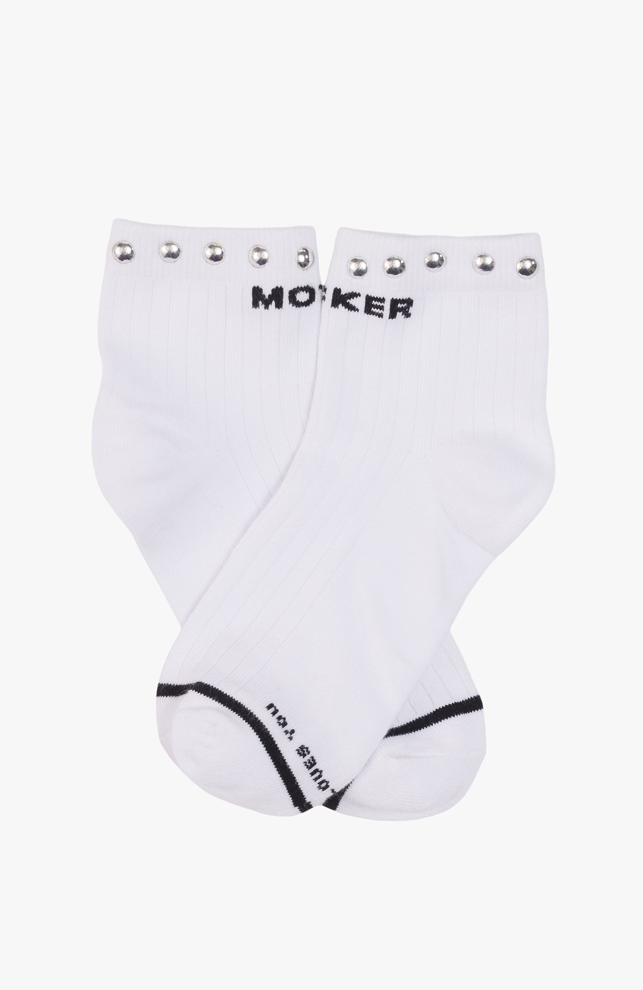 A pair of white crew socks with black text reading 'MOKER' and 'Wear you' on the sole, decorated with silver metal studs along the top cuff.