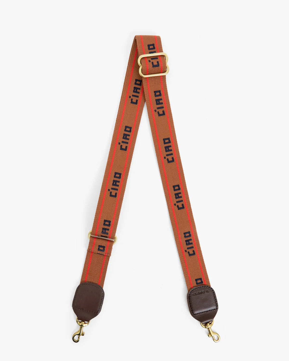 A wide orange-red fabric camera strap with a repeating black 'CIAO' logo print, featuring gold-tone metal hardware, a top adjustment buckle, and brown leather end caps with gold clasps, shown against a plain light gray background.