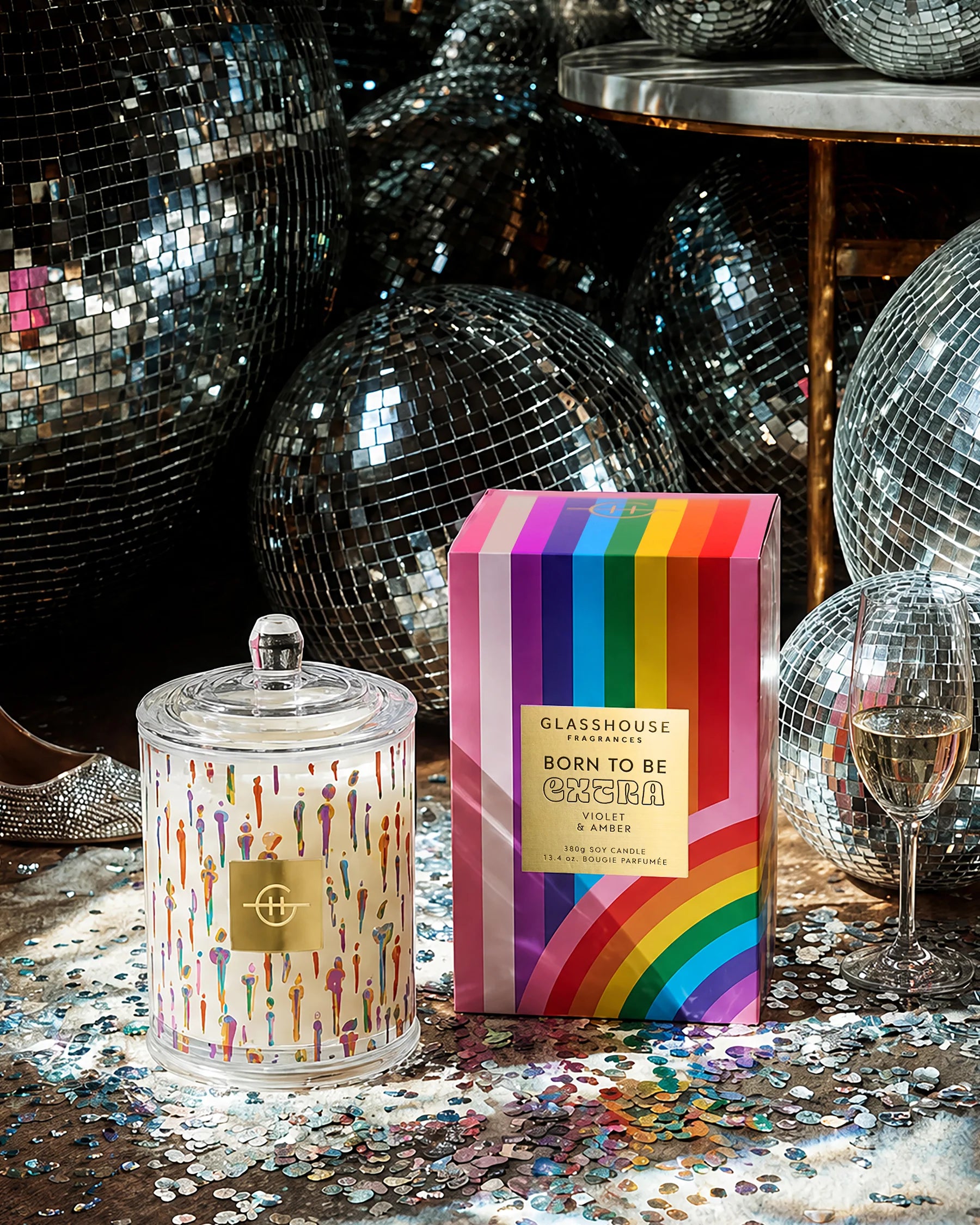 Glasshouse Candle Co. candle and packaging with disco balls in the background