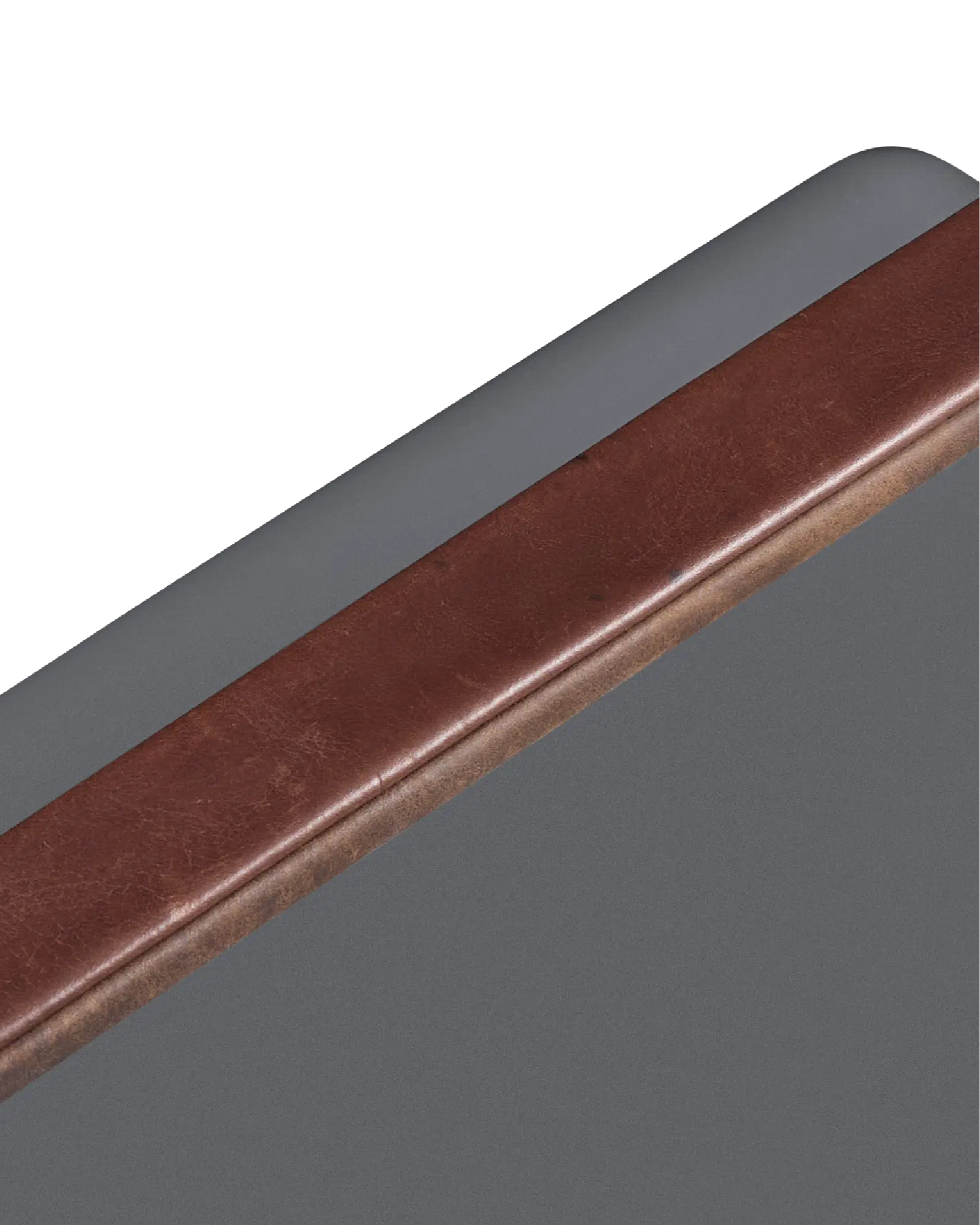 Close-up of a brown leather strip on a gray background