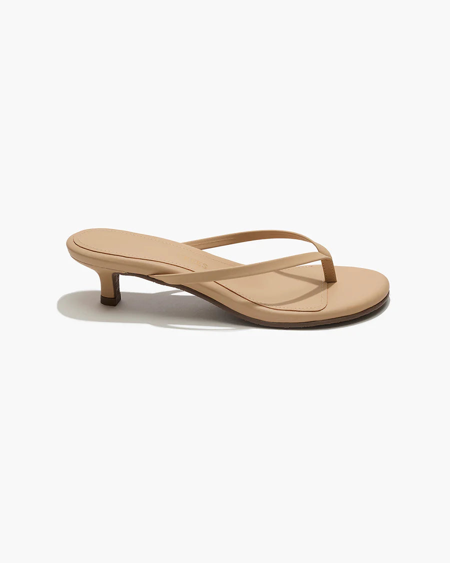 Beige sandal on a white background