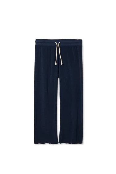 Navy blue sweatpants with a drawstring on a white background