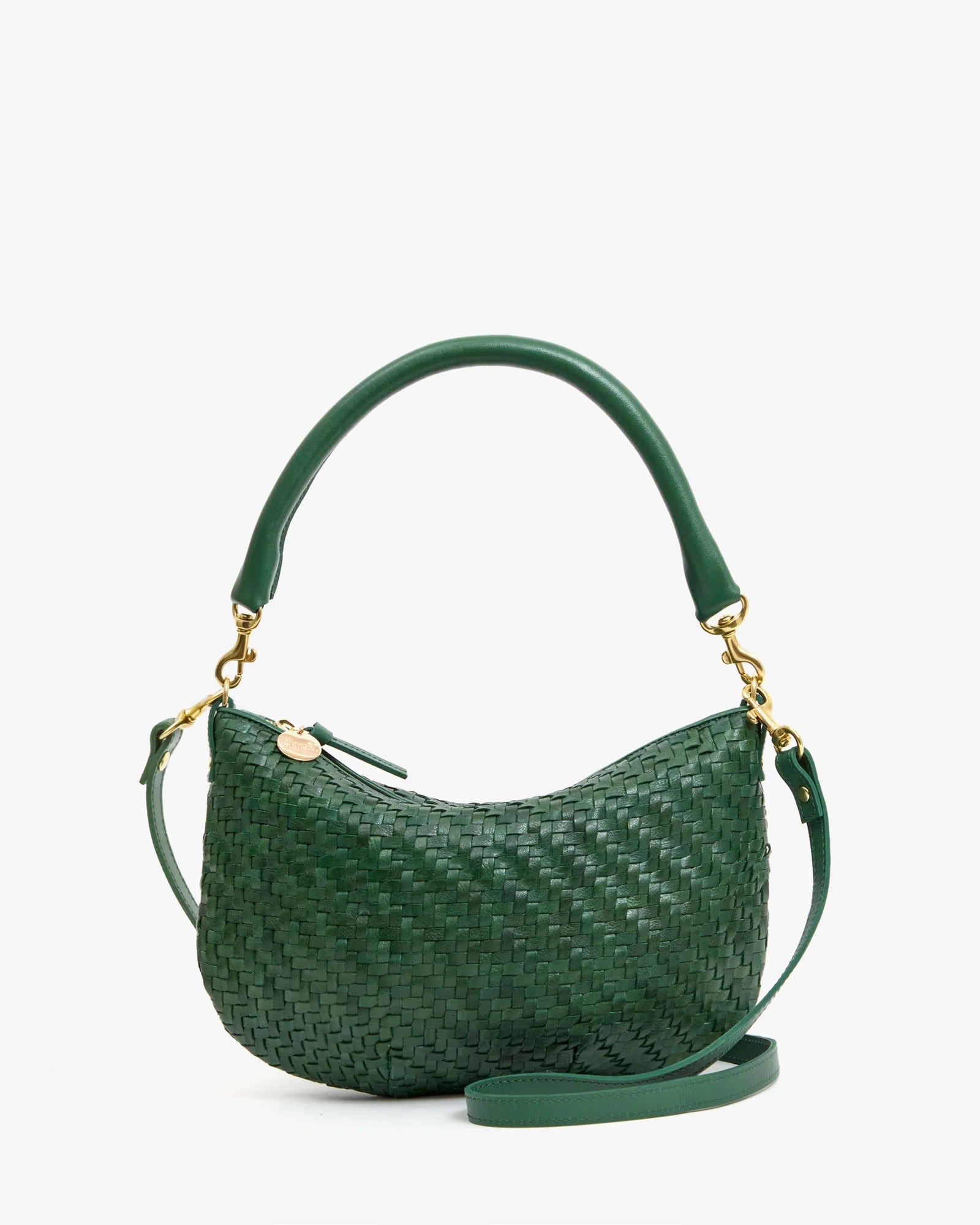 Green woven handbag with gold accents on a white background