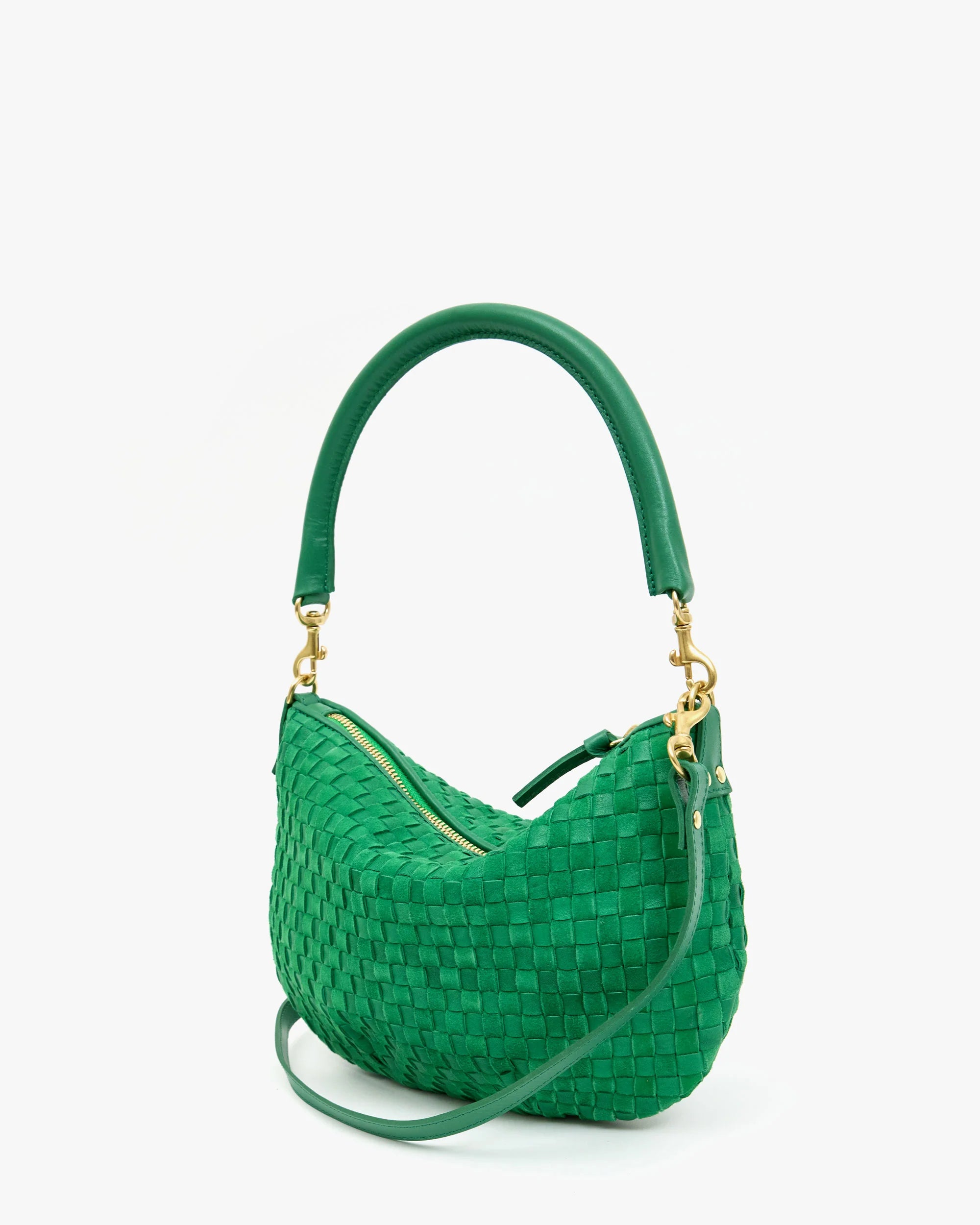 Green woven handbag with gold accents on a white background
