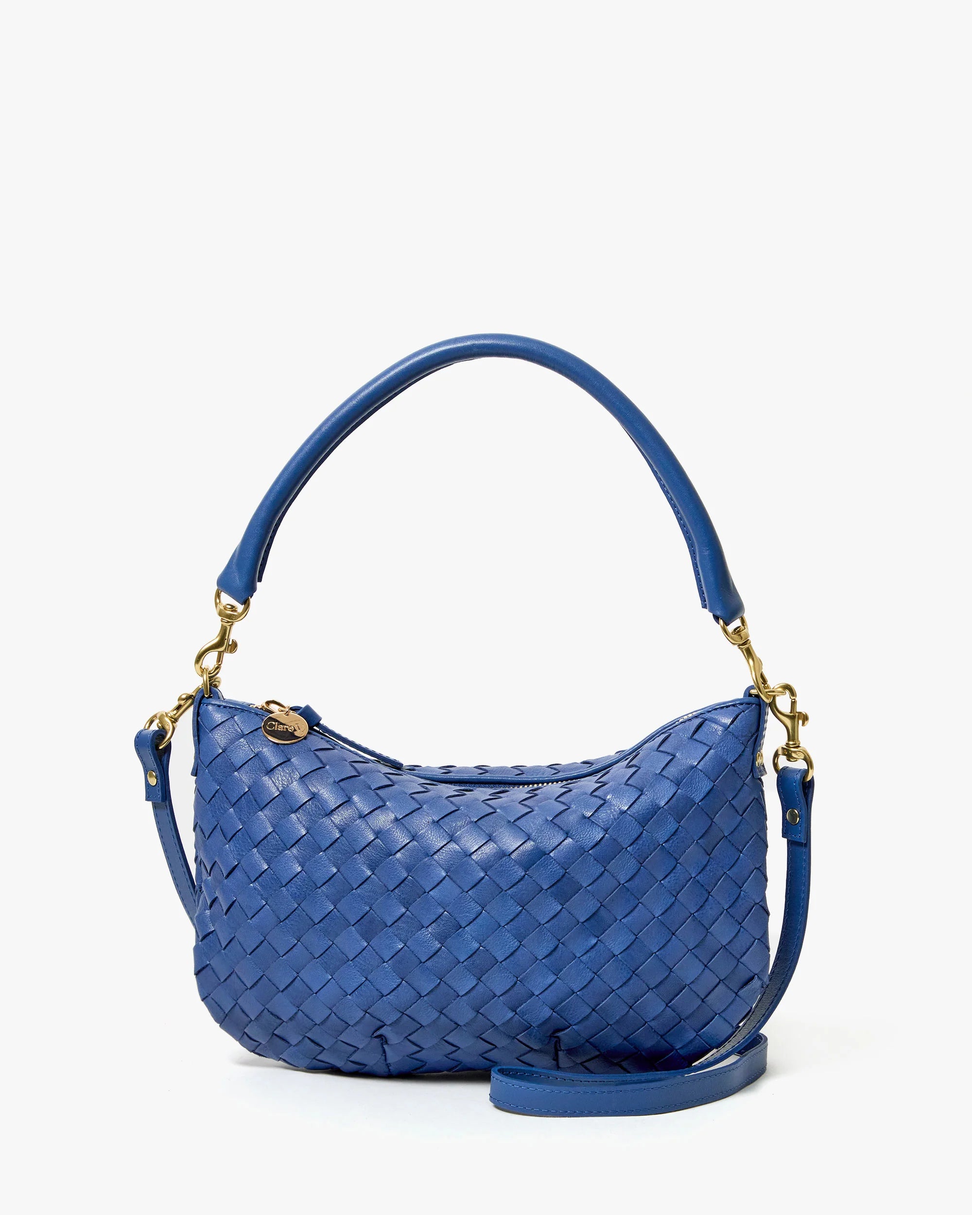 Blue woven handbag with gold accents on a white background