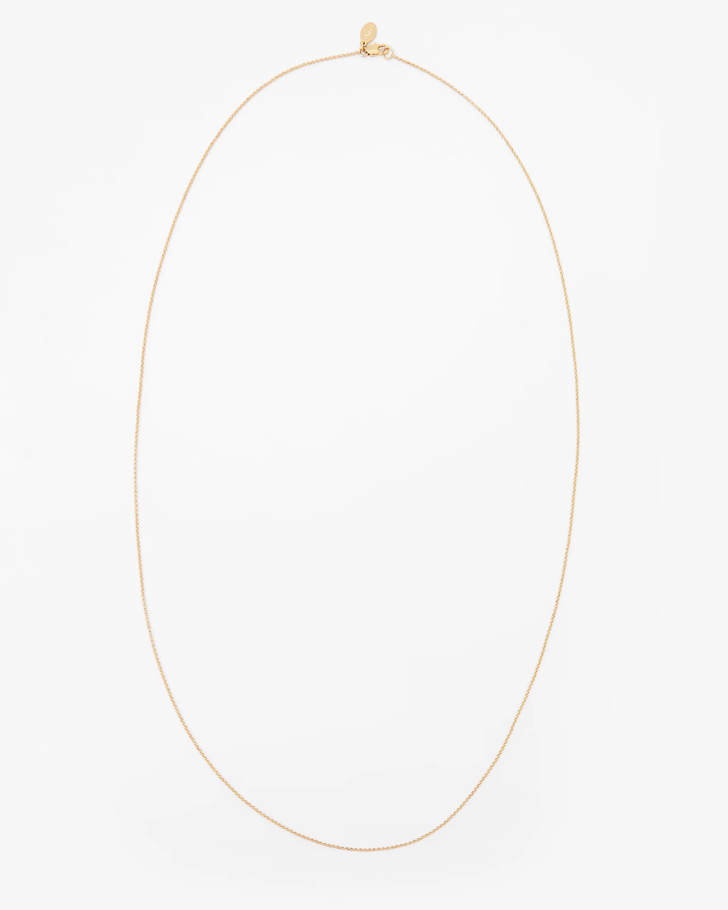 Gold necklace on a white background