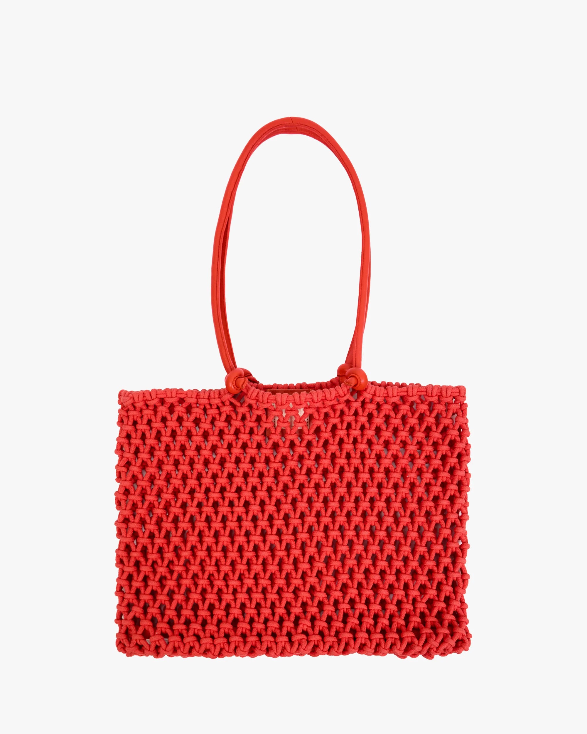 Red woven handbag on a white background