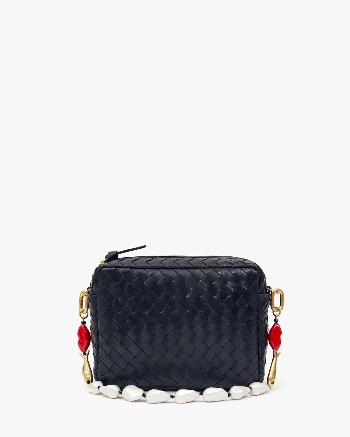 A small woven leather camera bag in black, featuring a gold-tone chain strap adorned with white stones and red bead accents, set against a plain white background.