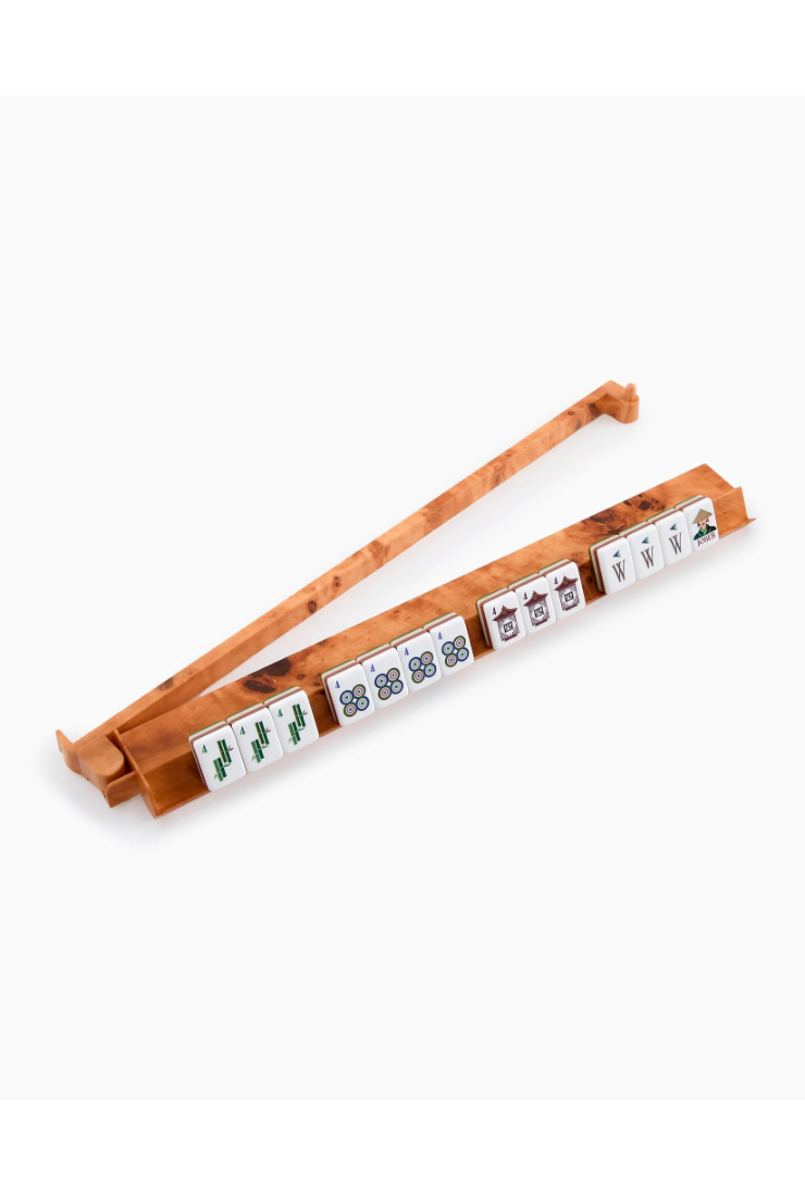 Wooden麻将 tile holder with tiles on a white background
