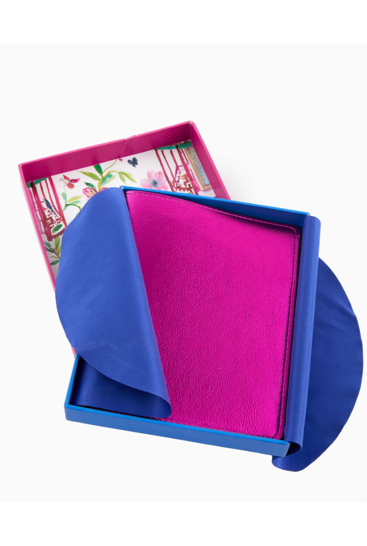 Blue and pink card in an open box on a white background