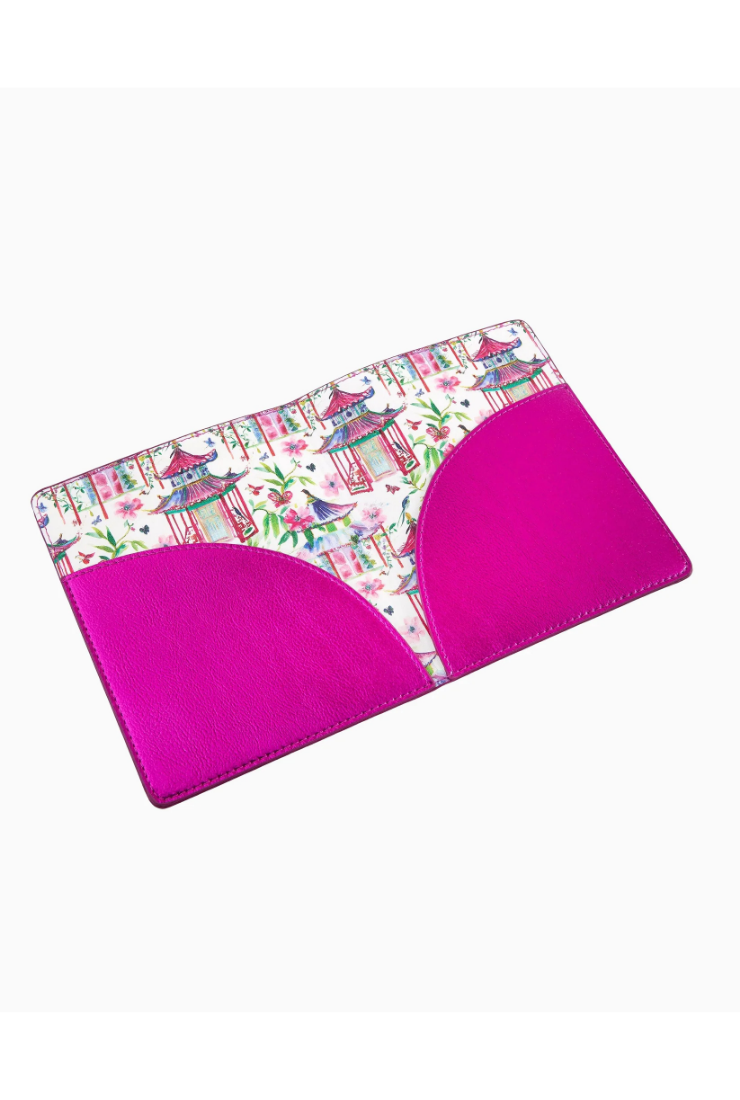 Pink mouse pad with a colorful pattern on a white background