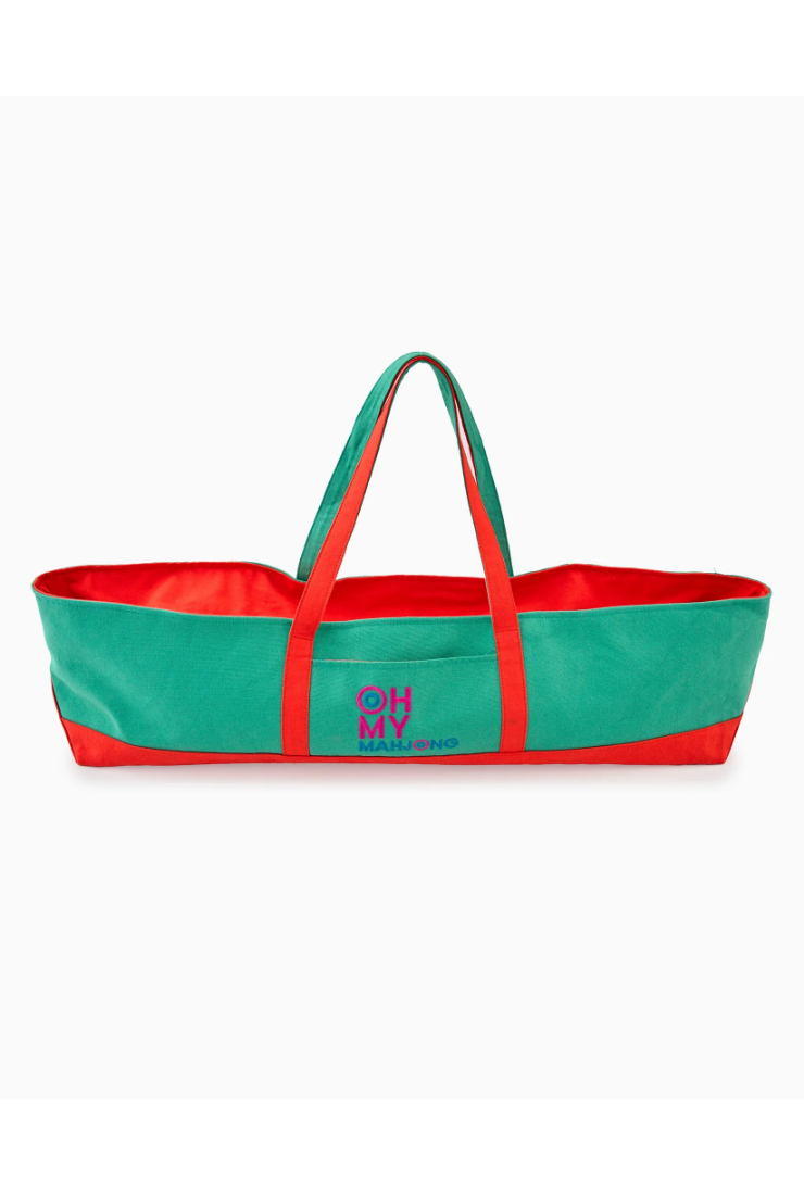 Green and red tote bag with a visible brand logo on a white background