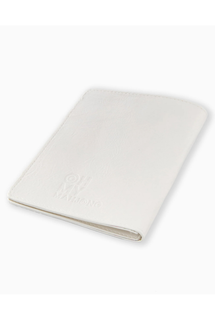 A folded white leather passport cover with an embossed logo and text on the front, photographed on a clean white background.