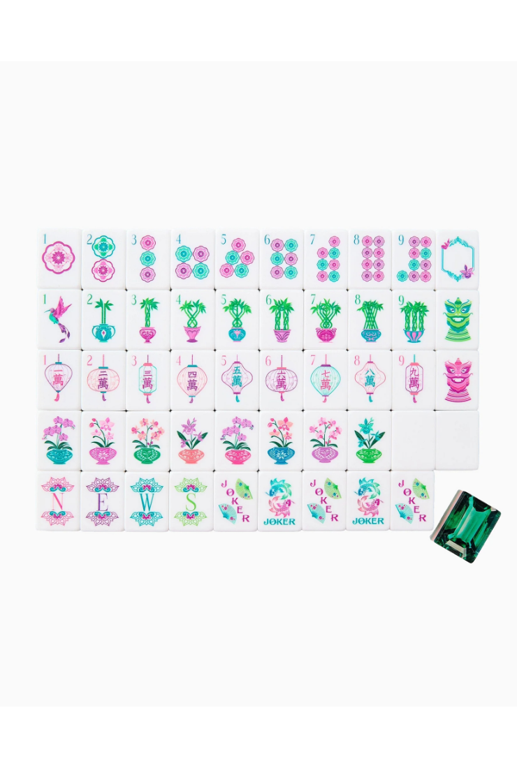 Sheet of colorful temporary tattoos with various designs on a white background.