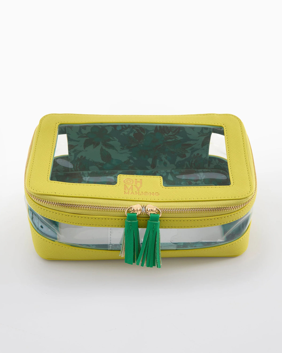 Yellow cosmetic bag with clear section and green tassel on a white background