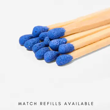 Several matchsticks with natural wood handles and bright blue porous match heads arranged on a white background, with the text 'MATCH REFILLS AVAILABLE' at the bottom.