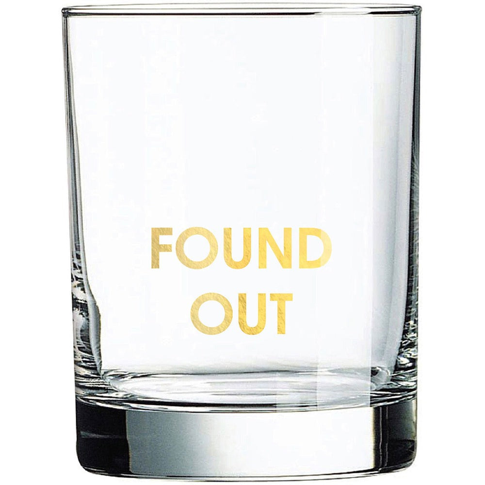 Clear glass with 'FOUND OUT' text in gold on a white background