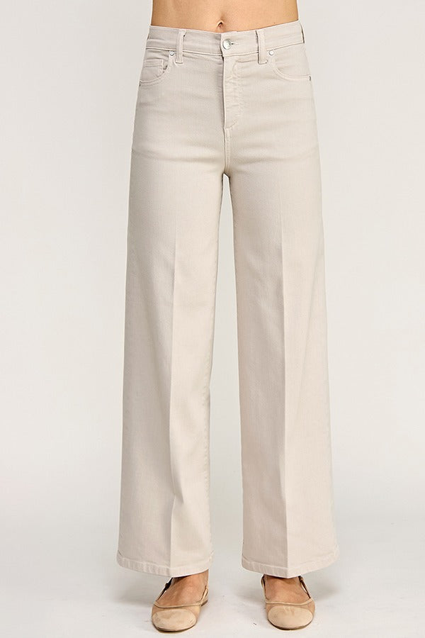 Beige wide-leg jeans on a white background