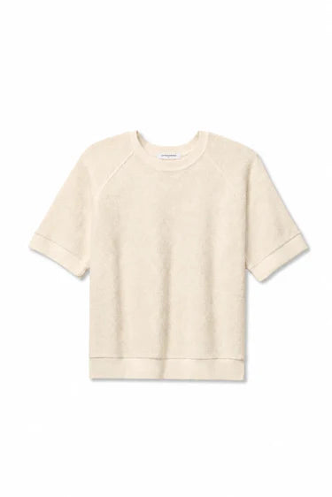 A cream-colored short-sleeve crewneck sweatshirt with raglan sleeves and ribbed cuffs, hem, and collar, displayed flat against a white background.