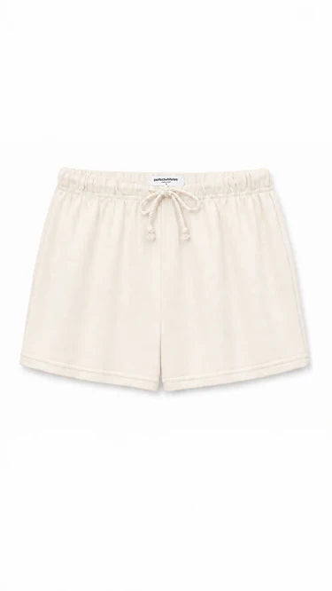 Beige shorts with a drawstring on a white background