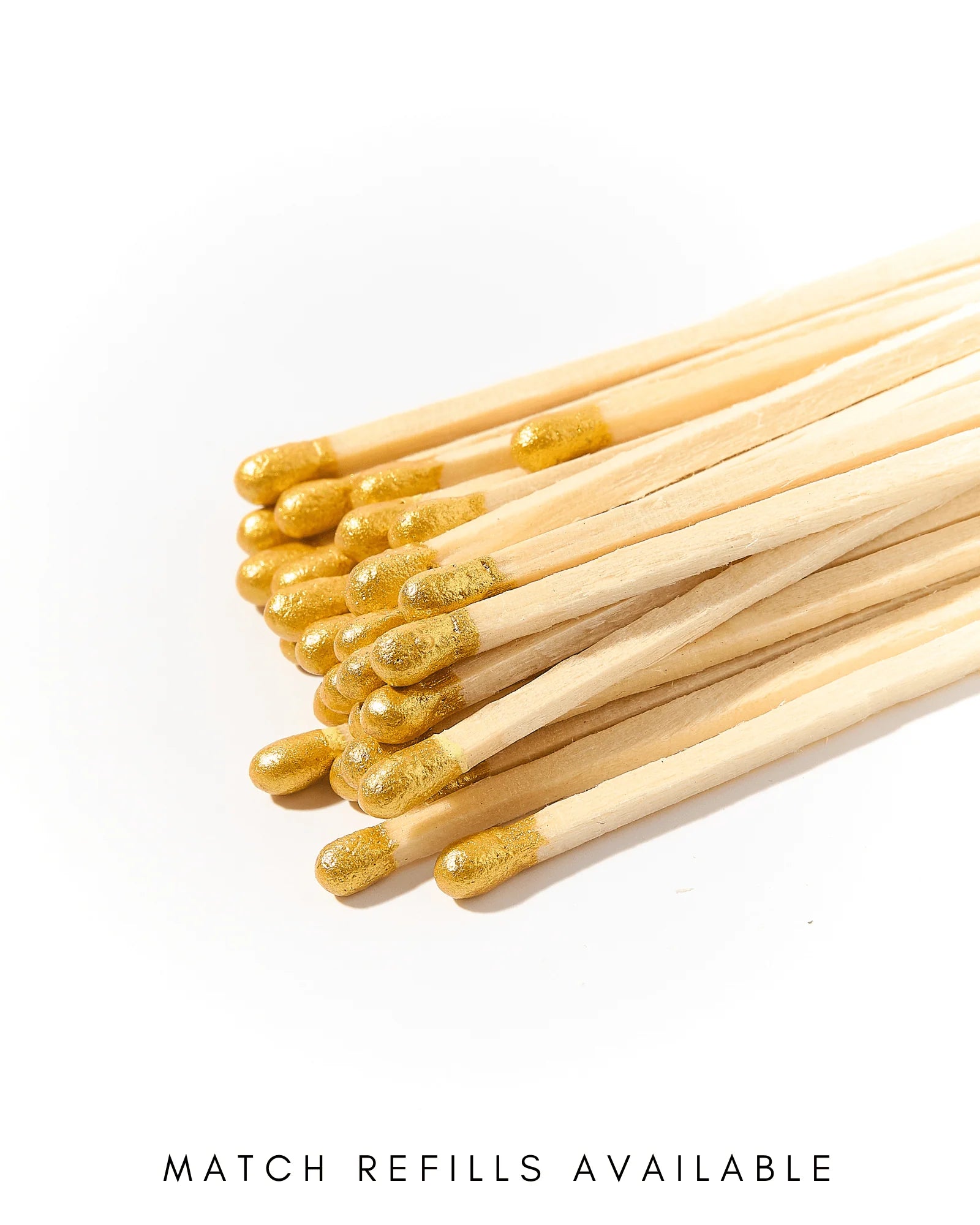 Matches with gold tips on a white background, labeled 'Match Refills Available'.