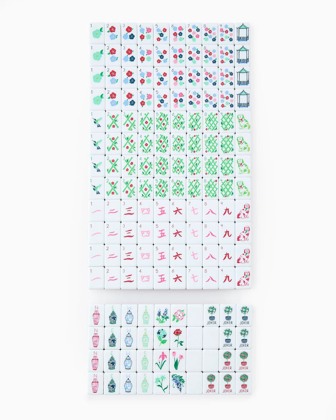 Set of colorful miniature books with various designs on a white background