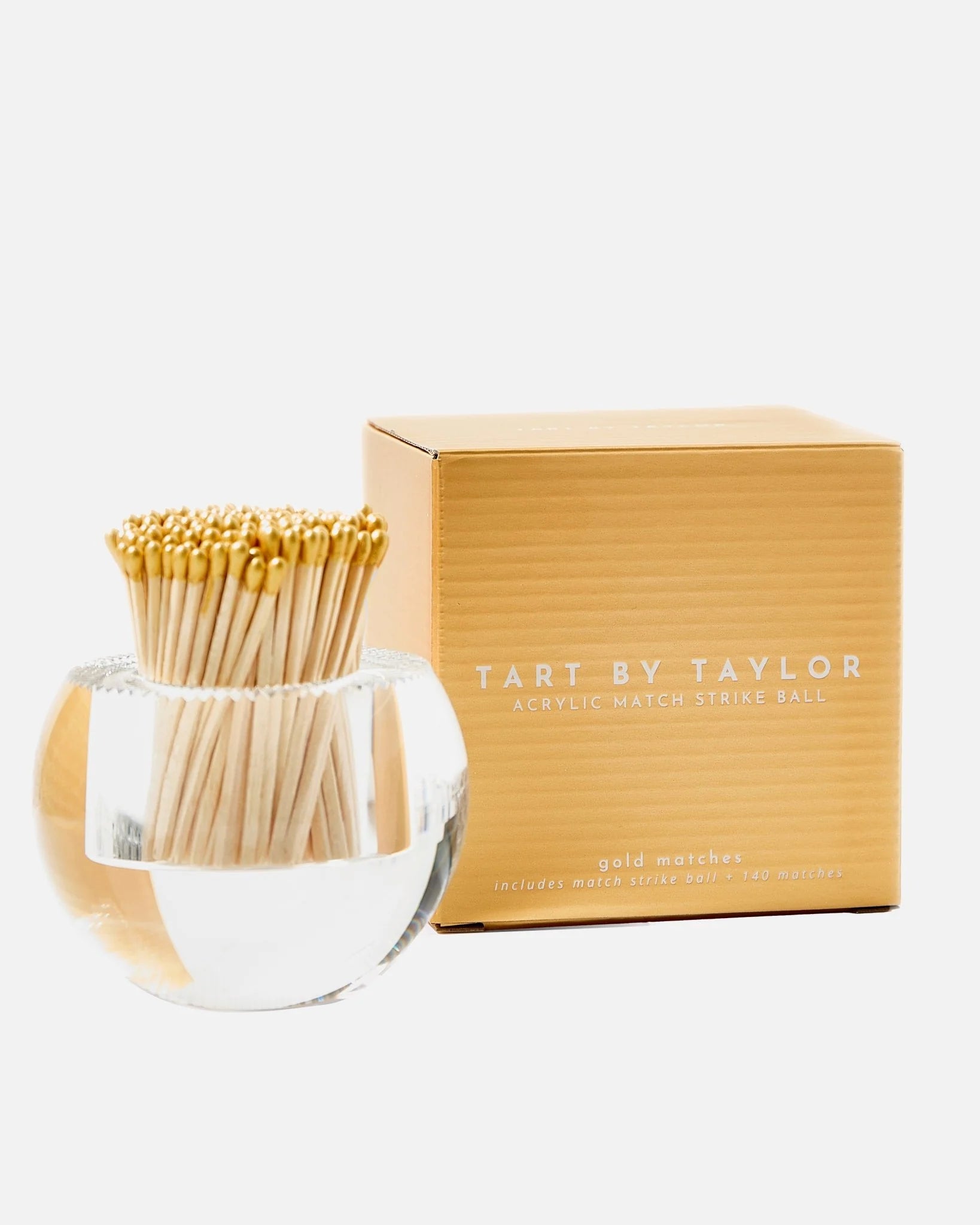 Match striker with gold matches and a matching box on a white background