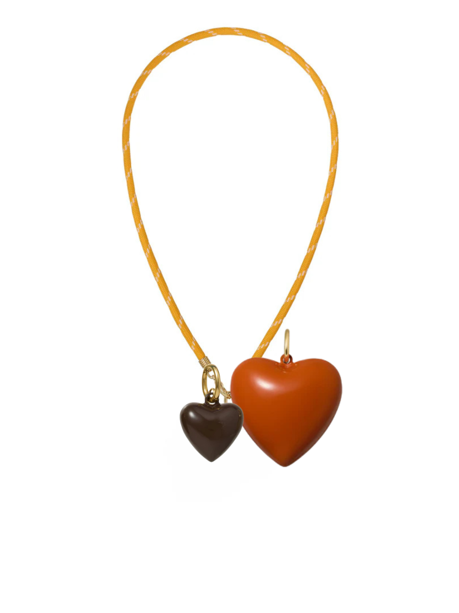 Necklace with two heart-shaped pendants on a white background