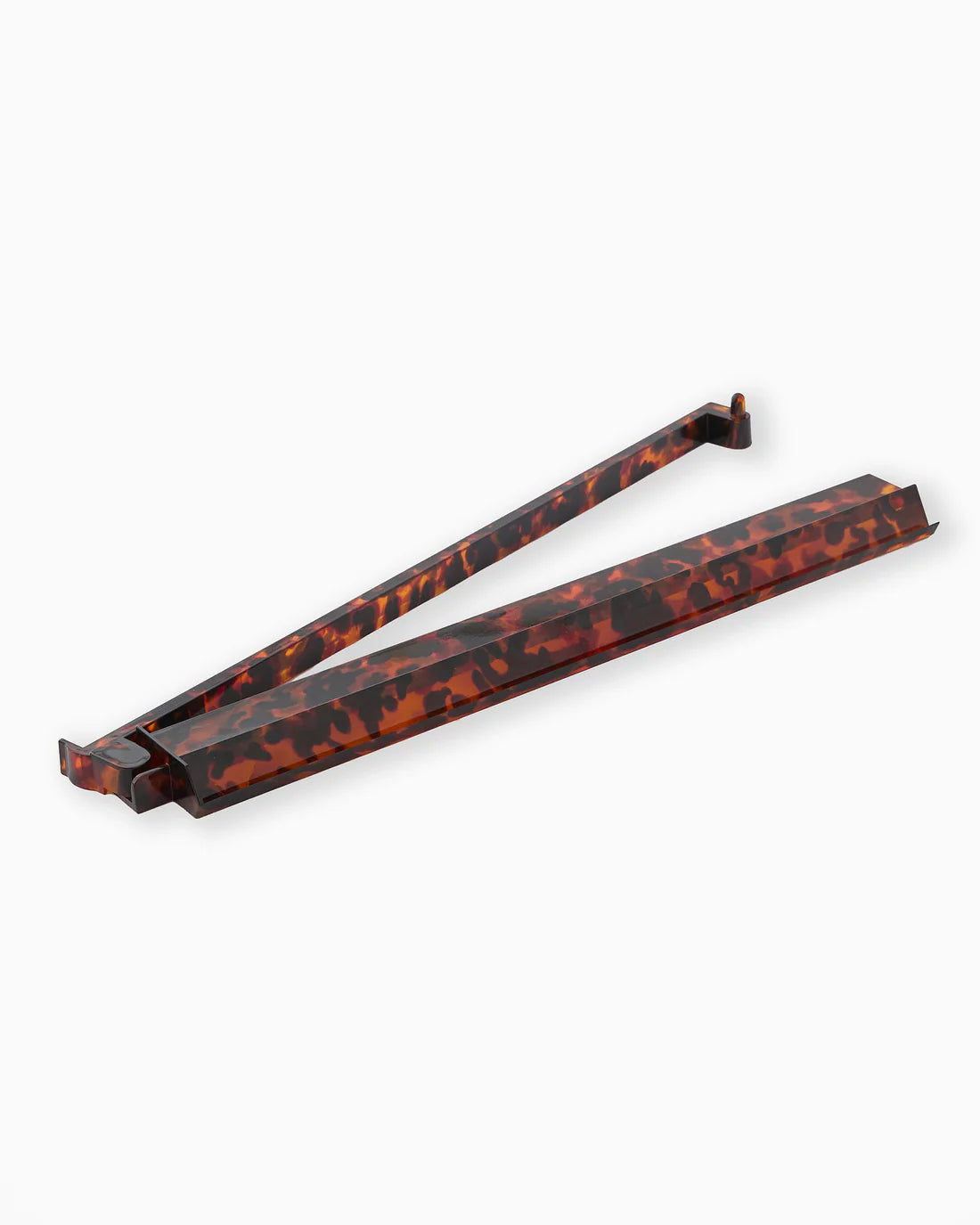 Two tortoiseshell-patterned metal brackets on a white background