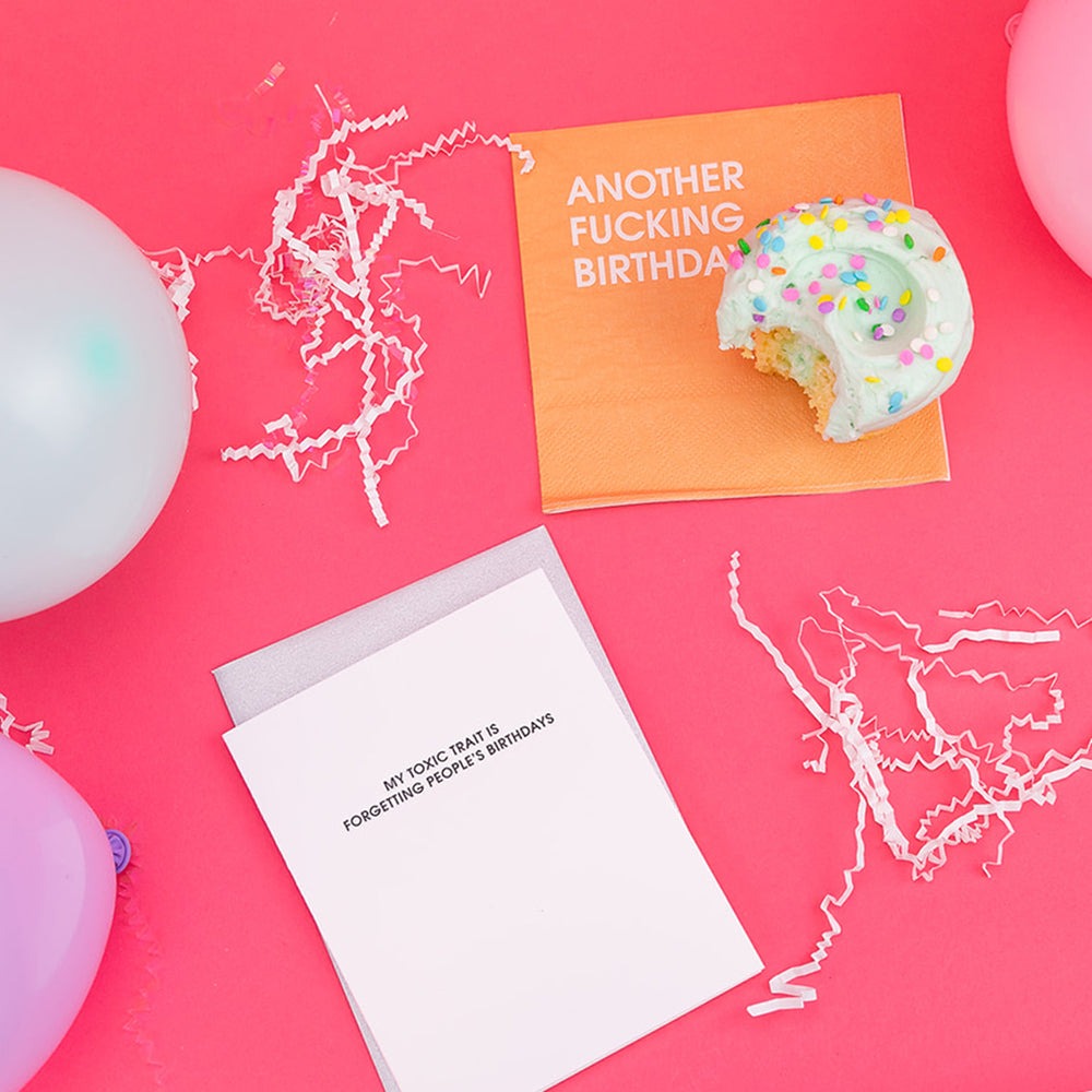 Two cards on a pink background with balloons and a birthday cake.