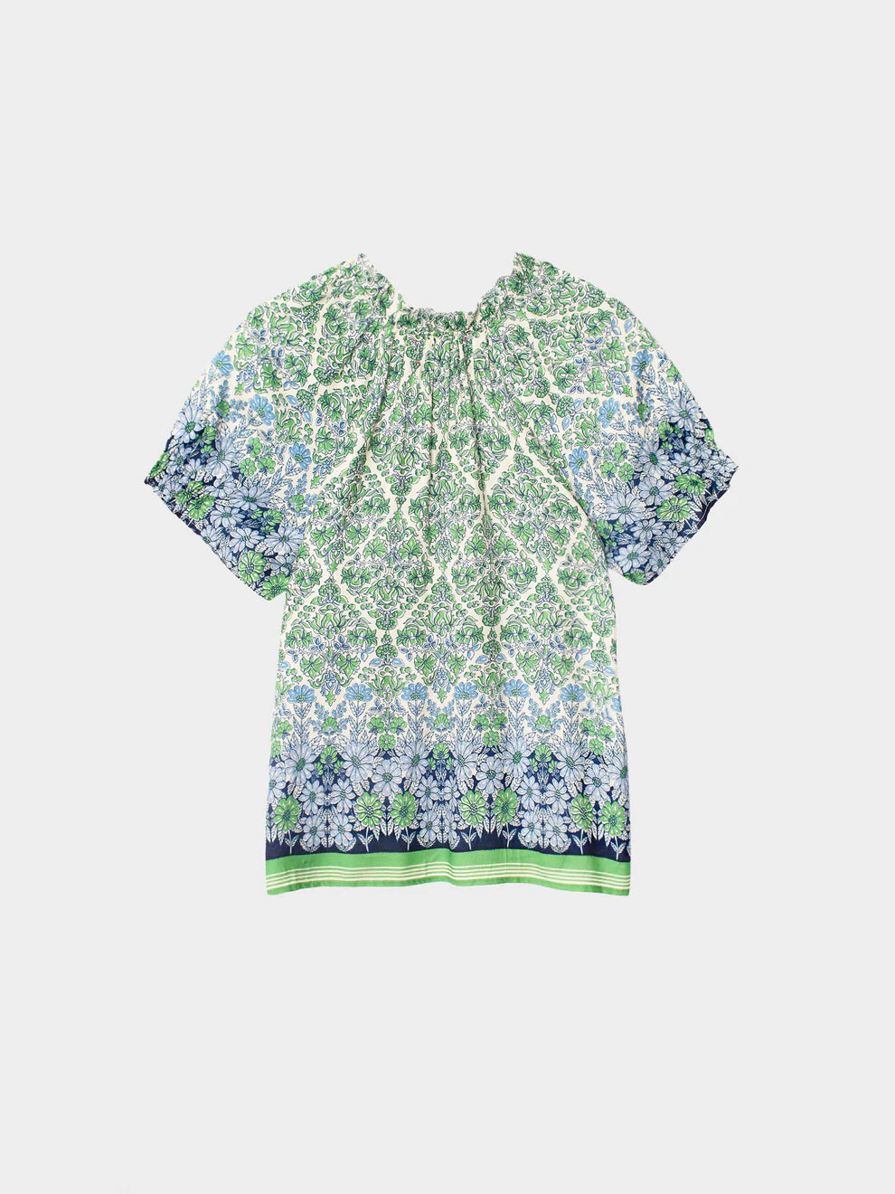 Green and blue patterned shirt on a white background