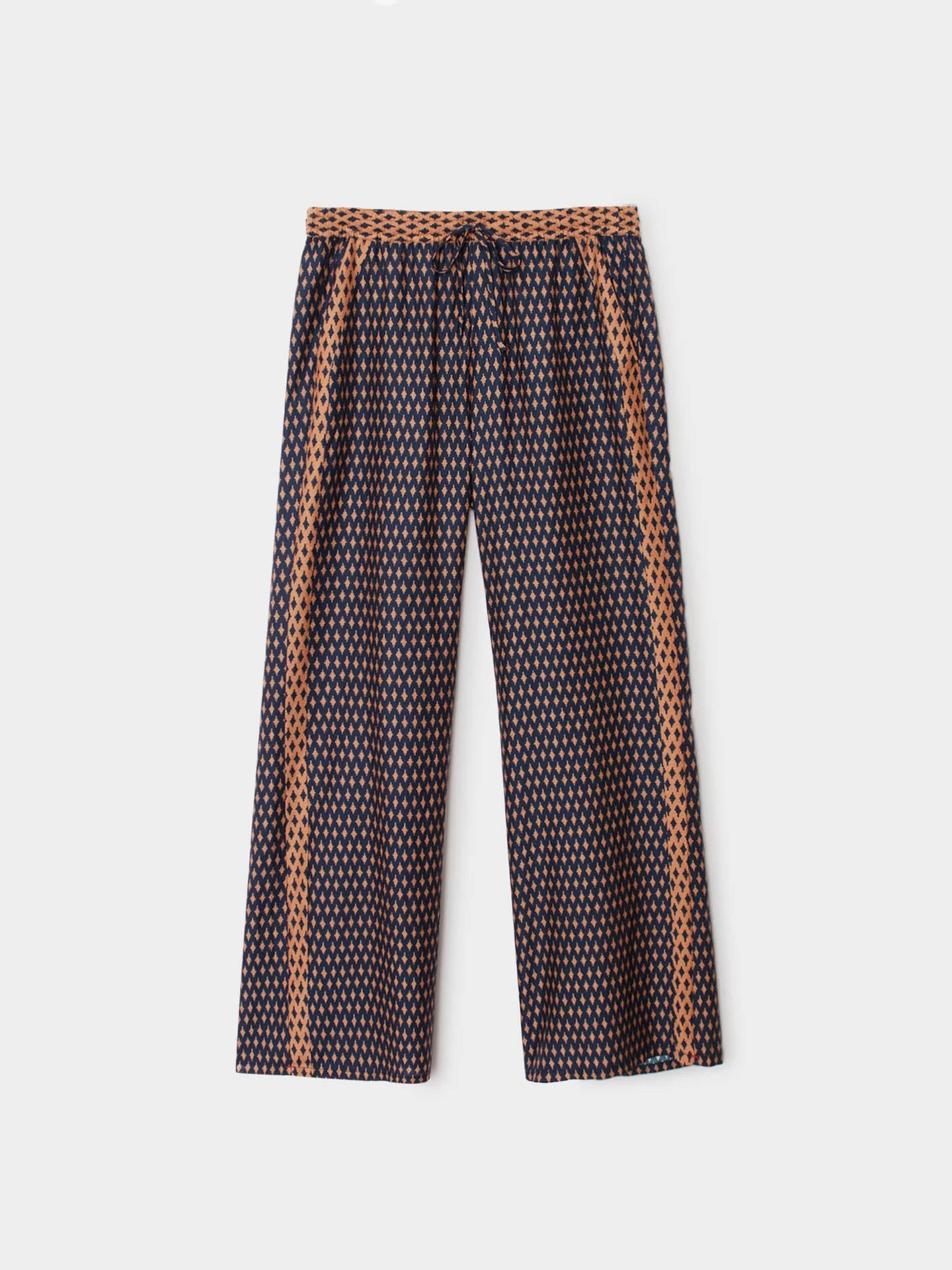 Patterned pants on a light gray background