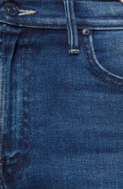Close-up of blue denim jeans with stitching details