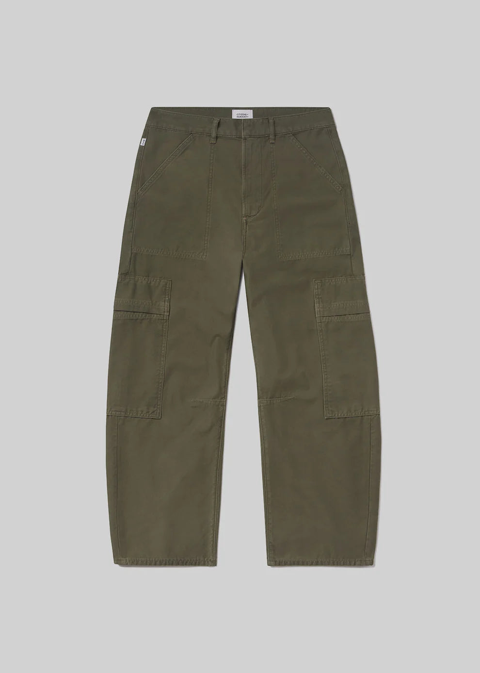 Green cargo pants on a light gray background