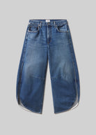 Blue jeans on a gray background