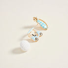 Golf-themed cufflinks with a golf ball on a light beige background