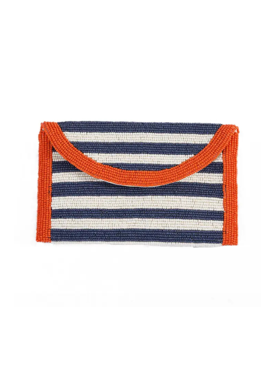 Striped clutch bag with orange handle on a white background