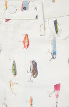 Pattern of colorful fishing lures on a white background
