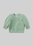 Green sweatshirt on a light gray background