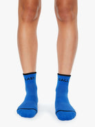Blue socks with text on a white background