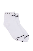 A pair of white ankle socks with silver metal grommets on the ribbed cuffs, black text reading 'MOT FUC' on the side, and a black stripe near the toe, shown on a plain white background.