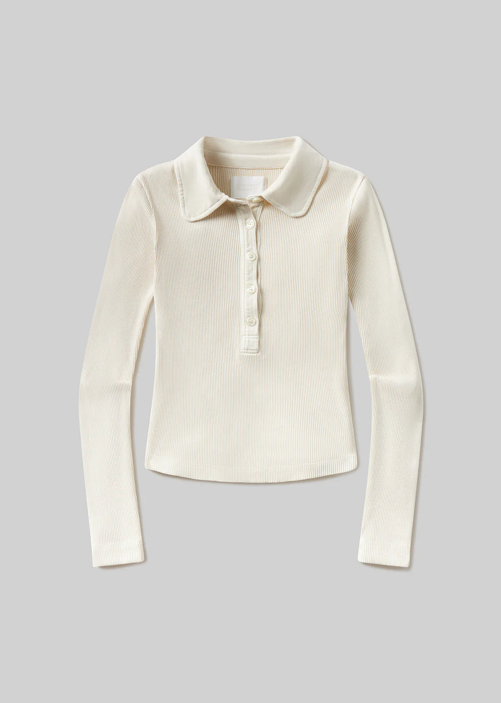 White long-sleeve shirt with collar on a gray background