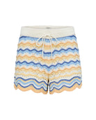 Colorful wavy patterned shorts on a white background