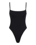 Black swimsuit with lace trim on a white background