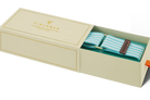 Open beige box displaying a pair of turquoise striped socks with brown accents, branded 'Fieldbar'.