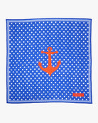 Blue polka dot pocket square with an orange anchor on a white background